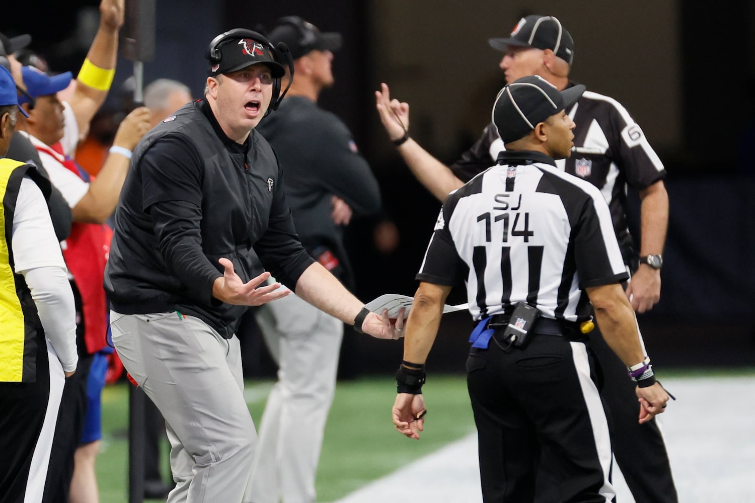 Falcons coach Arthur Smith argues with an official after a call during the fourth quarter against the Buccaneers on Sunday in Atlanta. (Miguel Martinez / miguel.martinezjimenez@ajc.com)