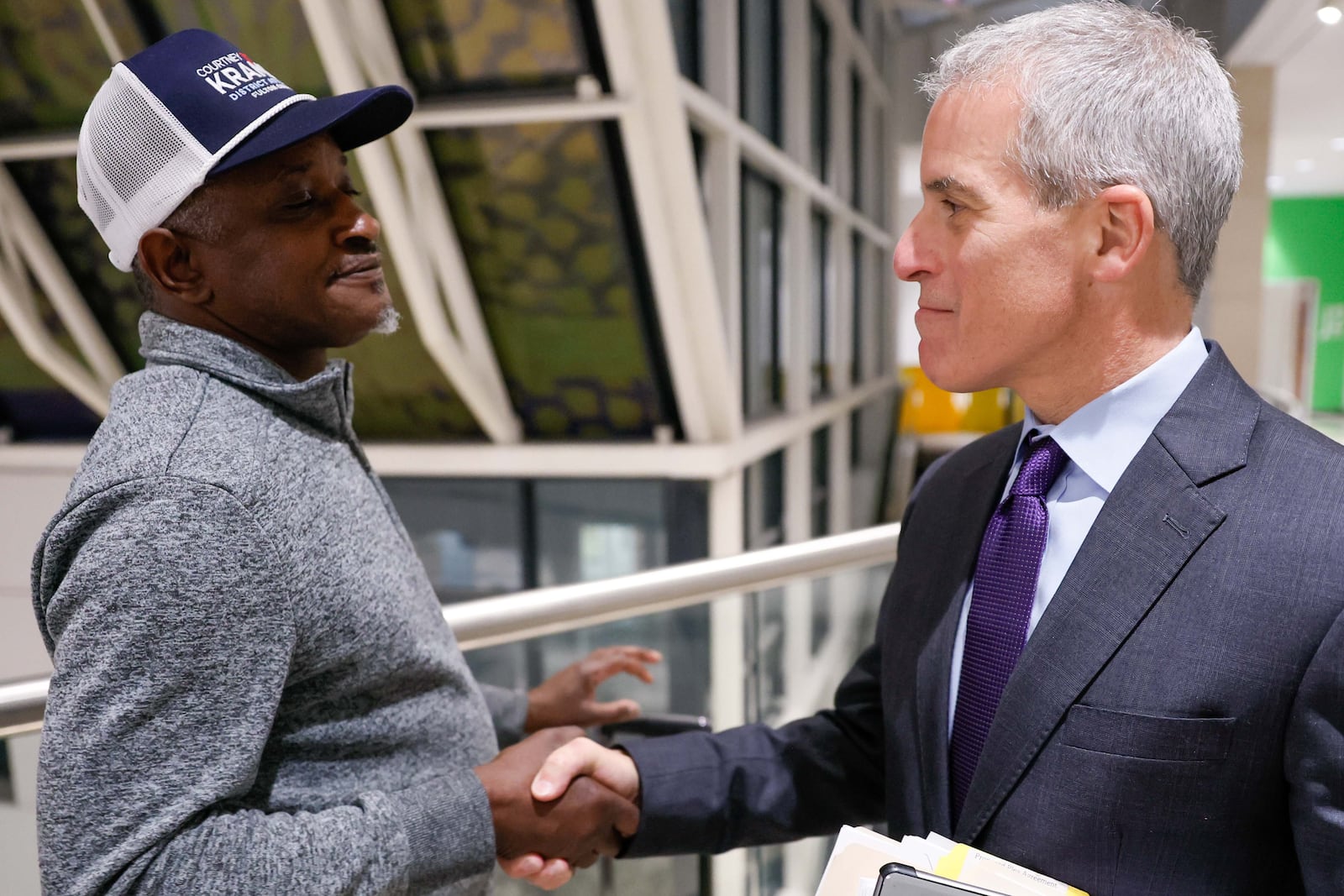 Attorney Brian Steel shakes hands with Young Thug’s father, Jefferey Williams Sr, outside the courtroom after his son took a plea deal on Thursday, October 31, 2024.
(Miguel Martinez / AJC)