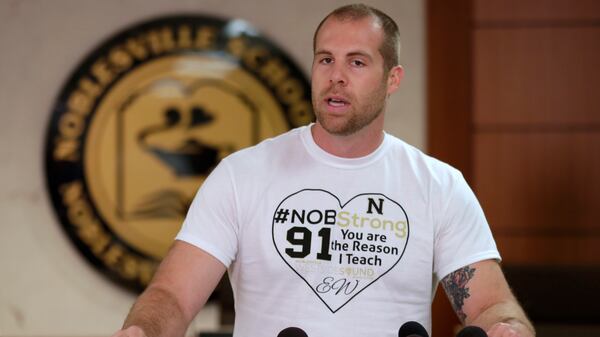 Jason Seaman, a seventh grade science teacher at Noblesville West Middle School in Noblesville, Ind., speaks to the media during a press conference Monday, May 28, 2018. Seaman tackled and disarmed a student with a gun at the school on Friday. He was shot but not seriously injured.