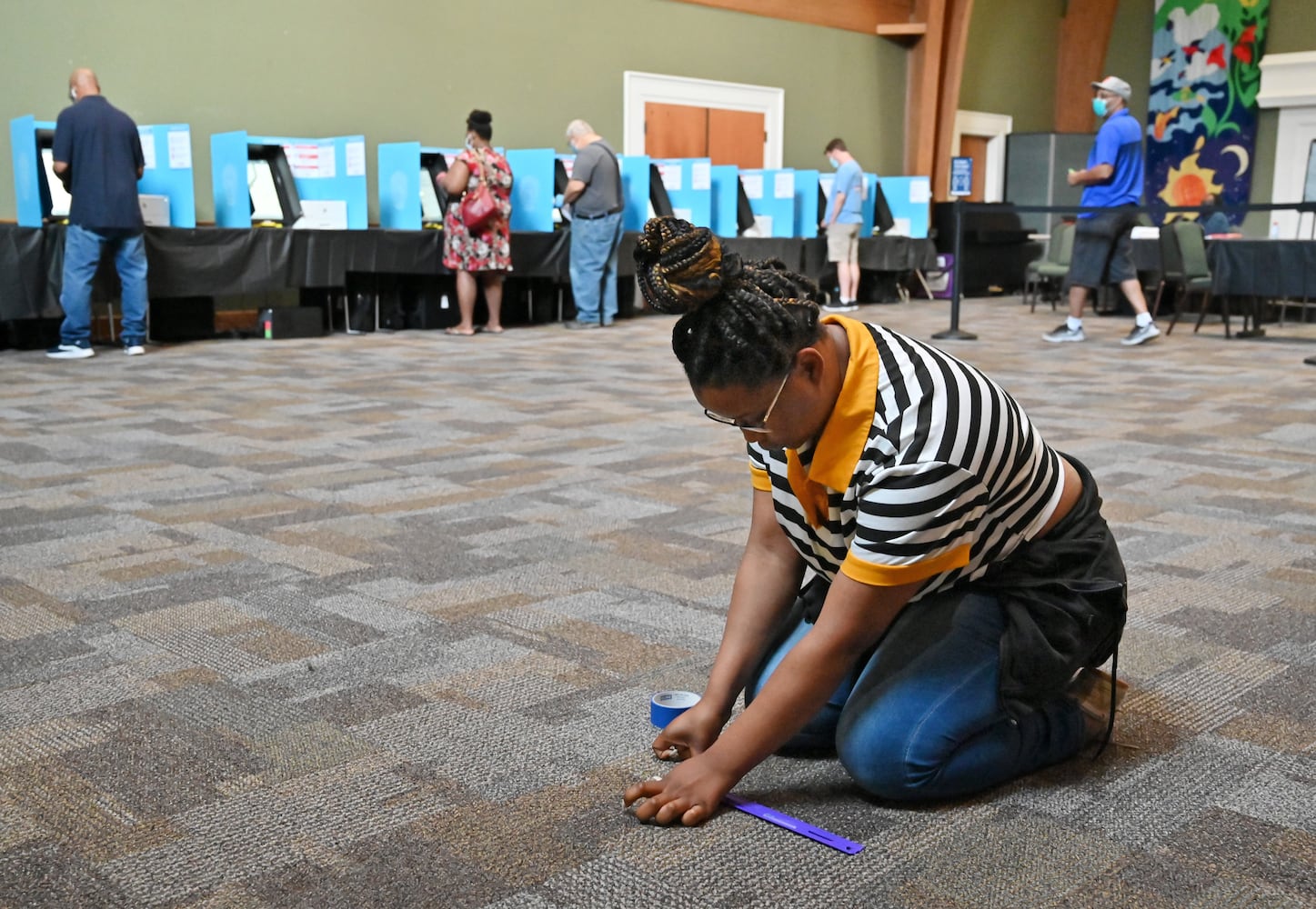 PHOTOS: Georgia voters struggle with long lines, new equipment, social distancing