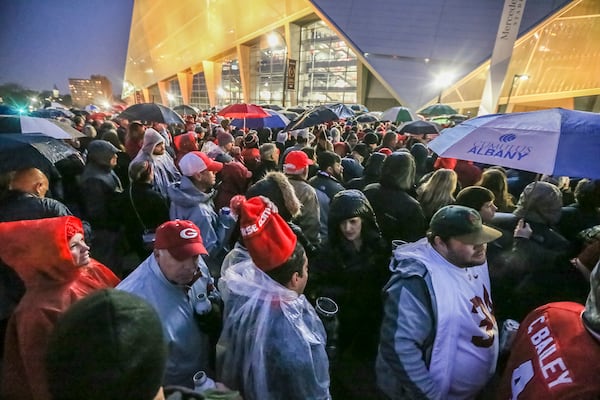 January 8, 2018 Atlanta: Crowds wait to get in the game in downtown Atlanta on Monday, Jan. 8, 2018, at Atlanta’­s Mercedes-Benz Stadium. JOHN SPINK/JSPINK@AJC.COM