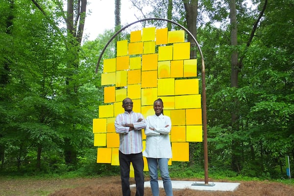 Kainebi Osahenye, left, with Lauren Tate Baeza at the unveiling of Osahenye’s "Pollen" during Lagos Atlanta: Sister City Rising, a project in 2023-24.