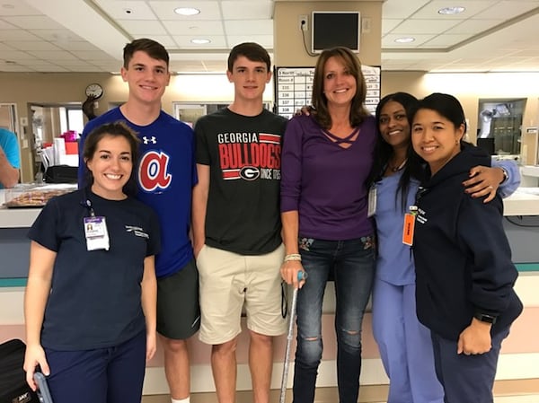 Janet Paulsen and her sons returned to Wellstar Kennestone Hospital to mark the third anniversary of the shooting and thank the ICU nurses who took care of her. CONTRIBUTED