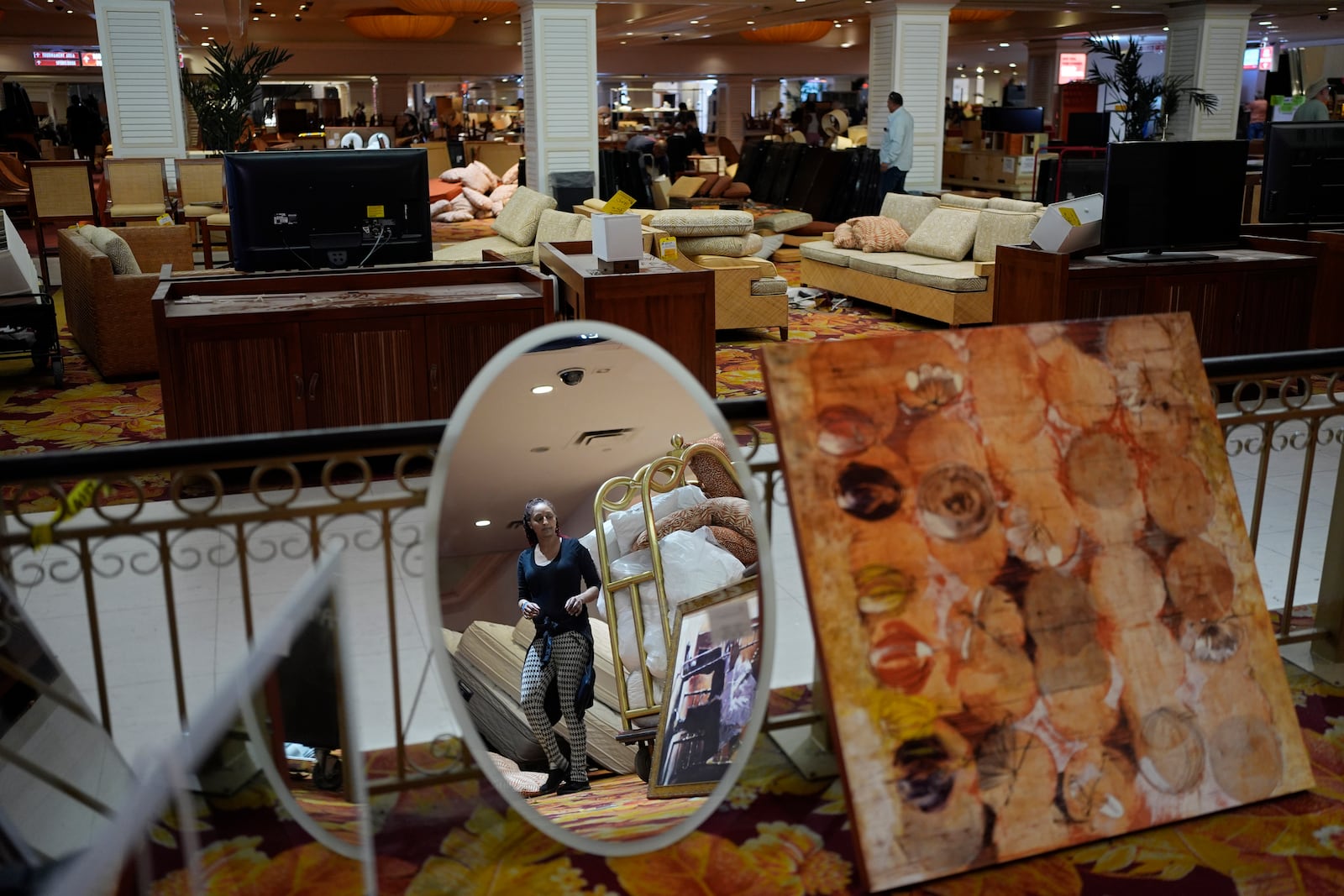 People look at items for sale at the shuttered Tropicana hotel-casino Saturday, May 25, 2024, in Las Vegas. (AP Photo/John Locher)