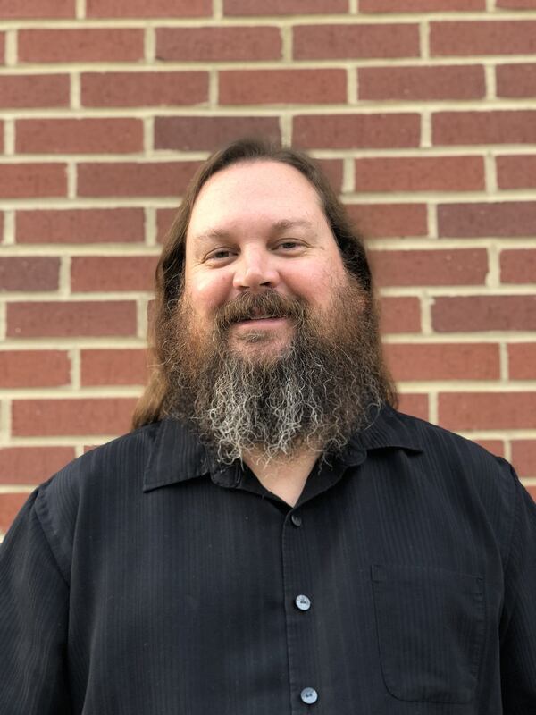 Todd Ferguson, of Dacula in Gwinnett County, decided to vote “a straight blue ticket” in the 2018 midterms. (AJC staff photo)