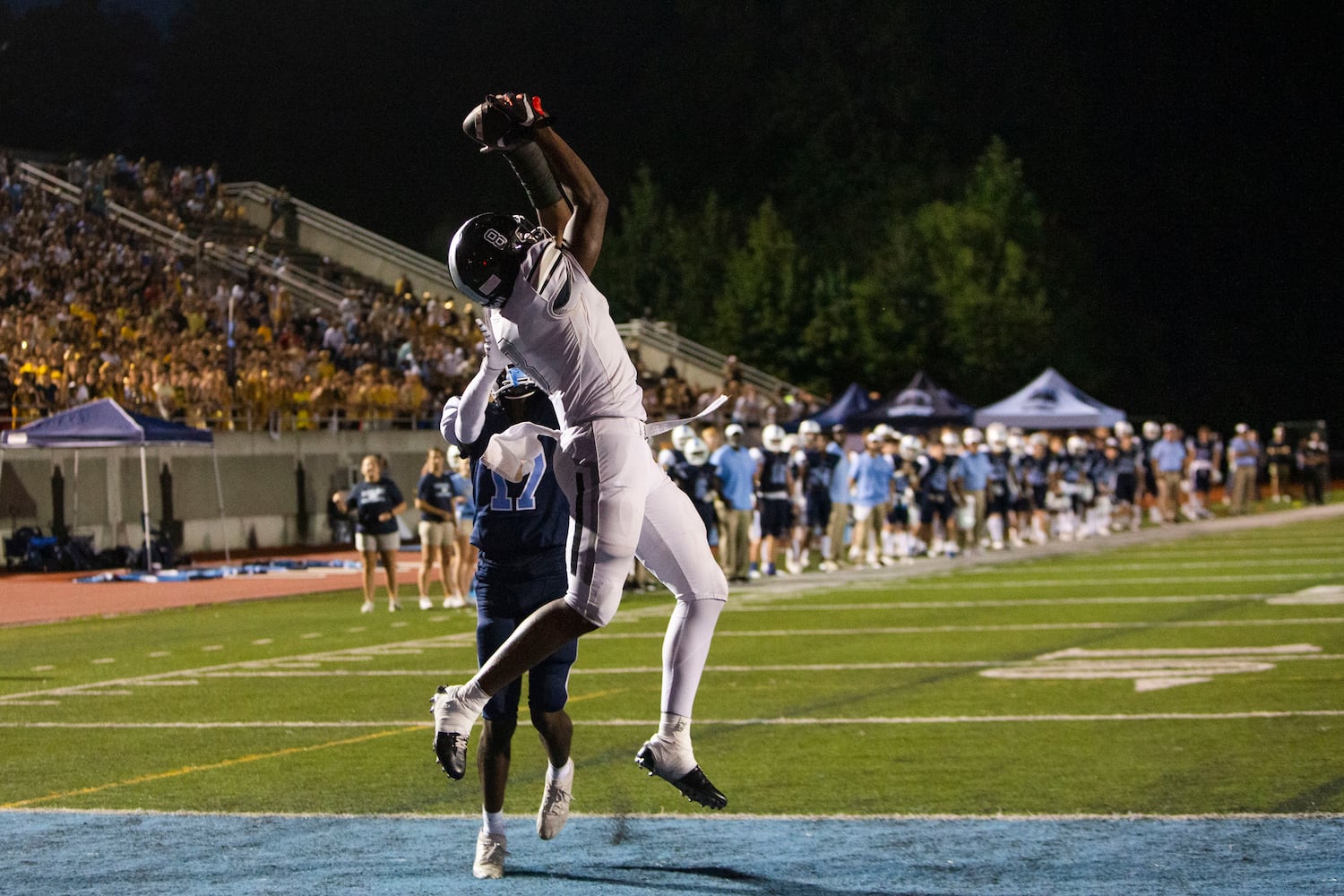 Jack Marlow, running back for Cambridge High School scores a touchdown during the Cambridge v. Alpharetta high school football game on Friday, September 2, 2022, at Cambridge High School in Milton, Georgia. Alpharetta tied Cambridge 28-28 in the third quarter. CHRISTINA MATACOTTA FOR THE ATLANTA JOURNAL-CONSTITUTION.