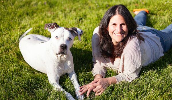 Lauren Janis and Big Daddy. Janis makes grain-free treats for dogs. CREDIT: Jessica Luce Photography