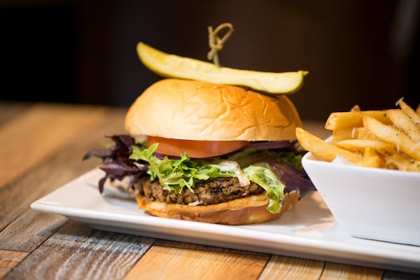 Gocha’s Impossible Burger, a plant-based patty, comes with Parmesan truffle fries. CONTRIBUTED BY MIA YAKEL