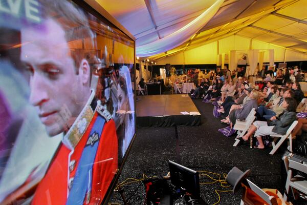 Prince William and Kate Middleton become man and wife in April 2011 while a crowd in Atlanta’s Piedmont Park watches the live broadcast on large screen TV's.  John Spink, jspink@ajc.com