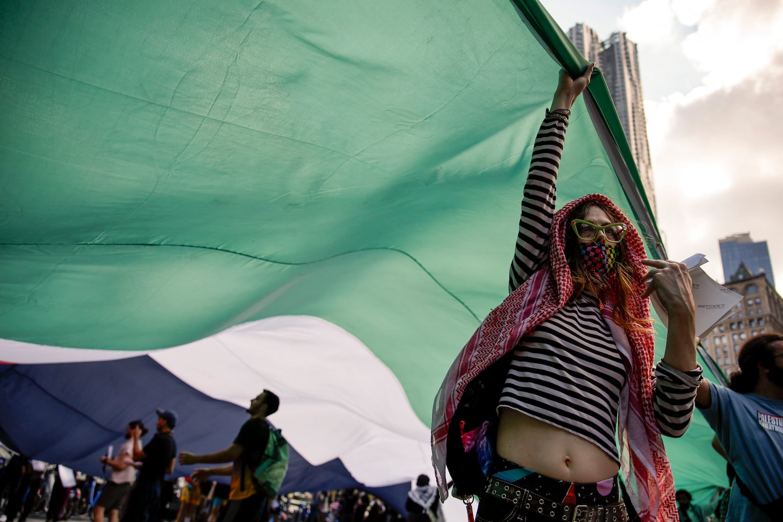 Pro-Palestinian protesters demonstrate outside City Hall, Monday, Oct. 7, 2024, in New York. (AP Photo/Stefan Jeremiah)