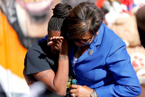 A family member reacts to news that the U.S. Justice Department had declined to charge Baton Rouge police officers in the fatal shooting of Alton Sterling on May 2, 2017, in Baton Rouge, Louisiana. Sterling was shot at close range while being held down by police.