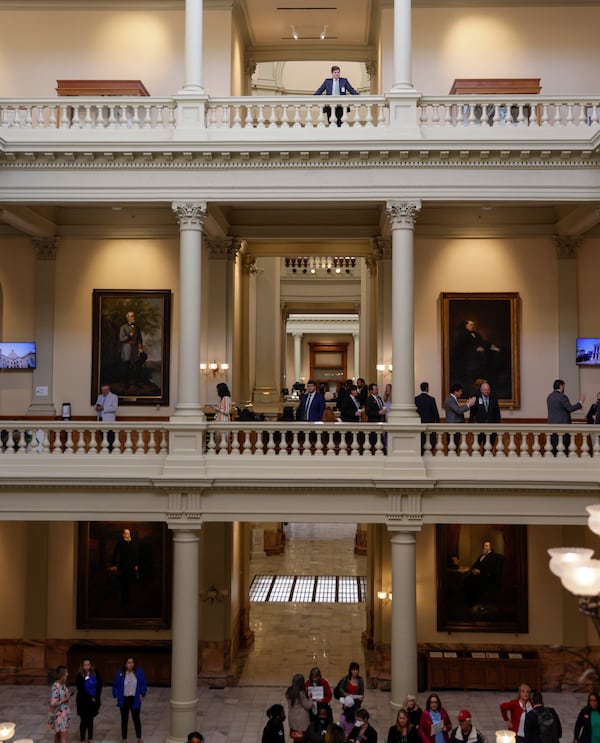 Lobbyists gather Monday in the Capitol as they wait for the session to start on Sine Die, the last day of the General Assembly for 2022. (Bob Andres / robert.andres@ajc.com)