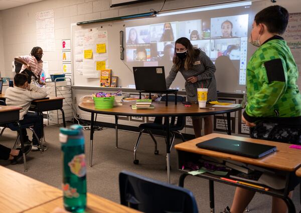 201102-Lawrenceville-Jordan Greene works with her “Roomies” and her “Zoomies” during fifth grade language arts at Freeman’s Mill Elementary School in Lawrenceville on Monday morning, Nov. 2, 2020. Ben Gray for the Atlanta Journal-Constitution