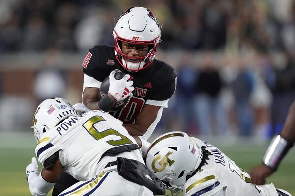 North Carolina State wide receiver Kevin Concepcion (10) runs the ball during the first half of an NCAA college football game, Thursday, Nov. 21, 2024, in Atlanta. (AP Photo/Brynn Anderson)