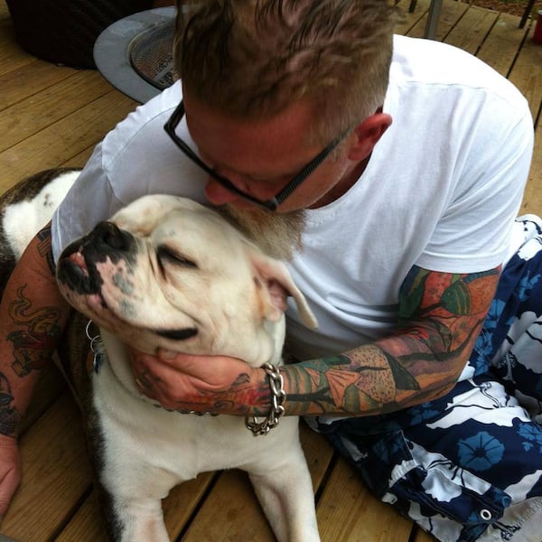 Shannon with his late bulldog Dutch. CREDIT: Facebook