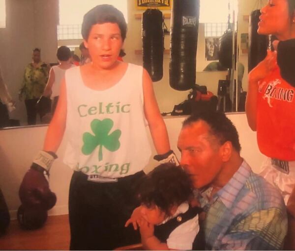 Nico Ali Walsh as a child with his grandfather, Muhammad Ali. (Courtesy of Mike Joyce)