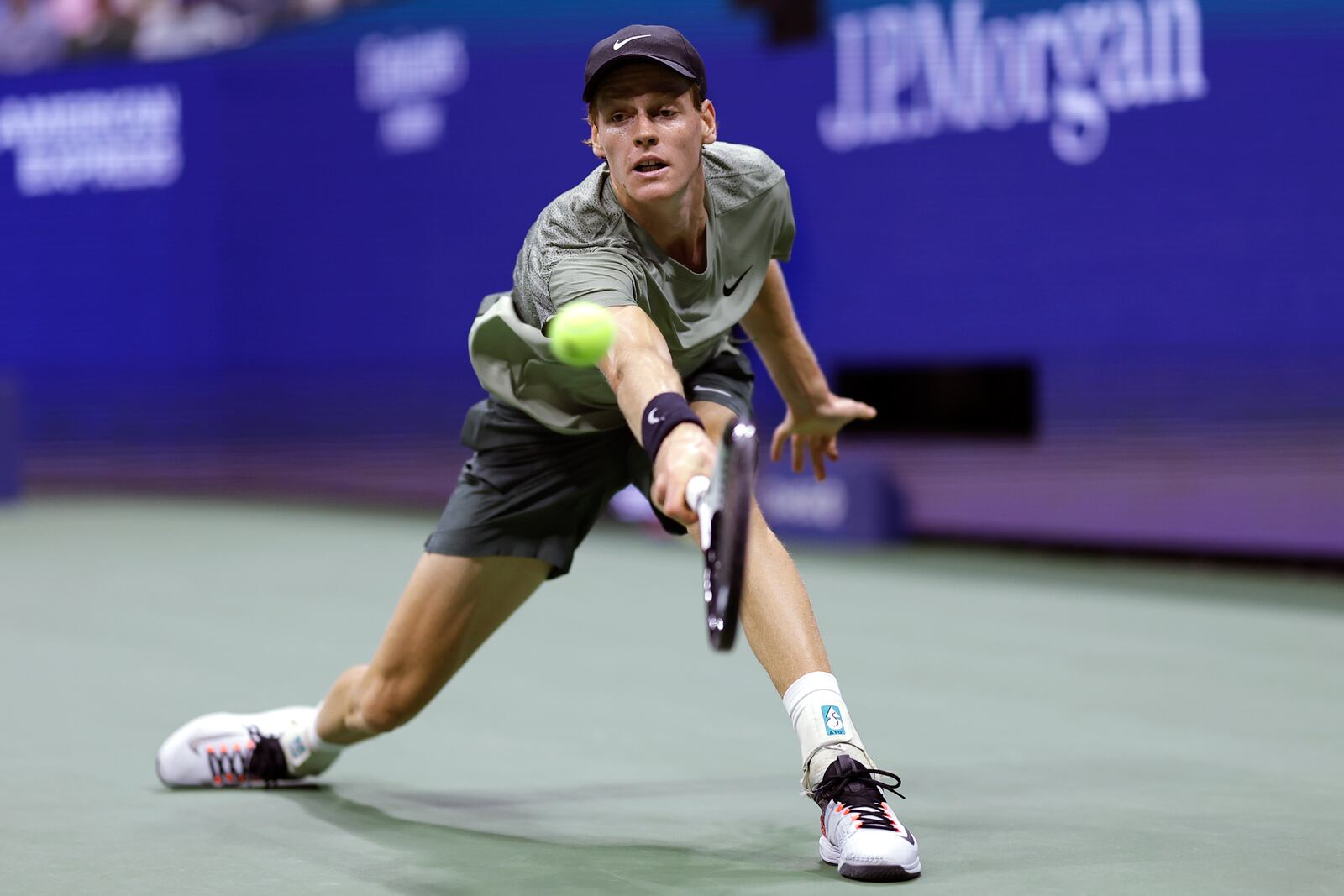 Jannik Sinner, of Italy, returns against Daniil Medvedev, of Russia, during the quarterfinals of the U.S. Open tennis championships, Wednesday, Sept. 4, 2024, in New York. (AP Photo/Adam Hunger)