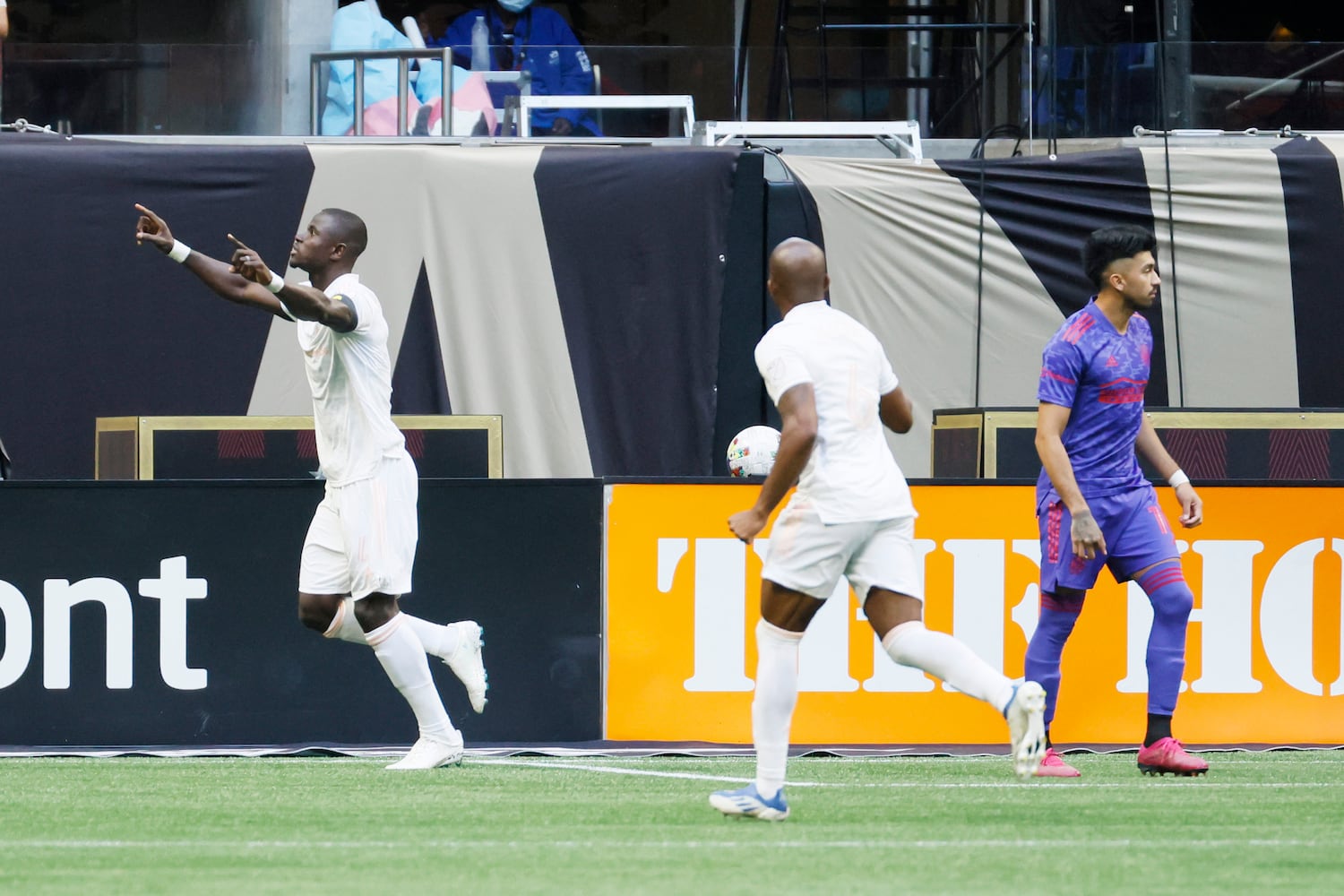 Columbus Crew captain Jonathan Mensah (4) celebrates the team's first goal in the minute one in the first half of an MLS soccer match at Mercedes-Benz Stadium on Saturday, May 28, 2022. Miguel Martinez / miguel.martinezjimenez@ajc.com