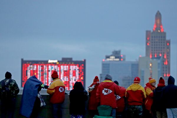 Chiefs fans wait for the parade to begin Wednesday in Kansas City, Mo.