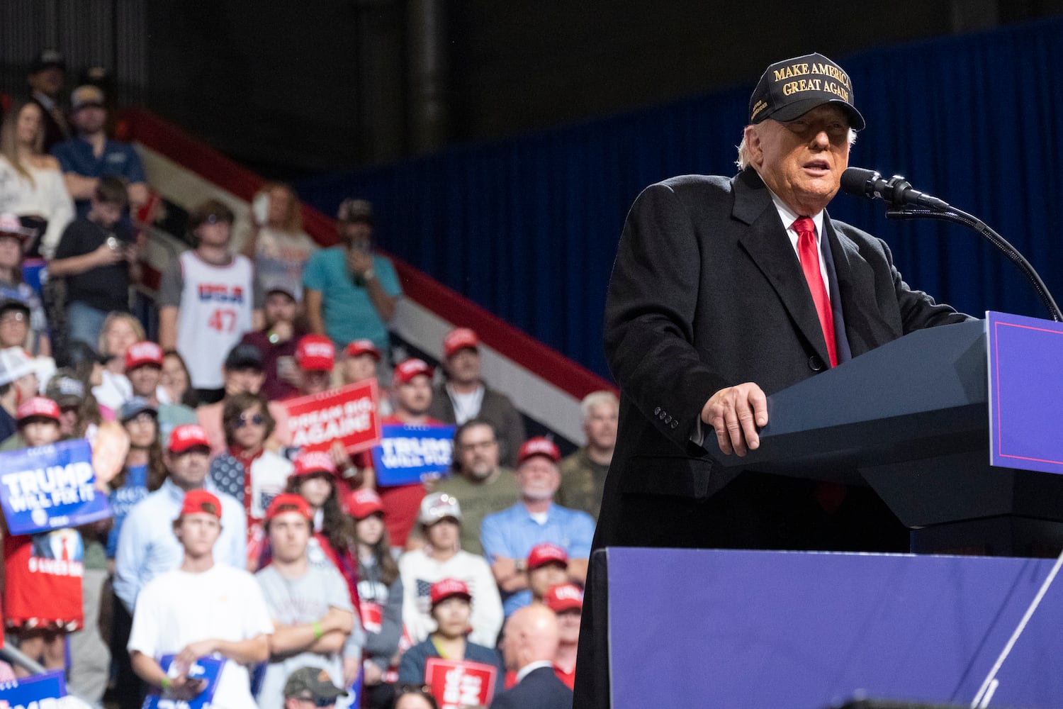 Former President Donald Trump gives remarks during a rally in Macon on Sunday, Nov. 3, 2024.   Ben Gray for the Atlanta Journal-Constitution