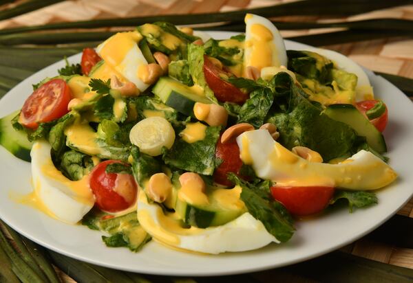 Yum Salat (Lao Salad with Egg Dressing) can be the focus of your summer meal or served alongside other dishes. (Styling by Ilene Rouamvongsor / Chris Hunt for the AJC)