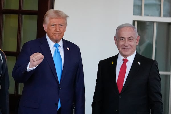 FILE - President Donald Trump greets Israeli Prime Minister Benjamin Netanyahu as he arrives at the West Wing of the White House, Feb. 4, 2025, in Washington. (AP Photo/Alex Brandon, File)