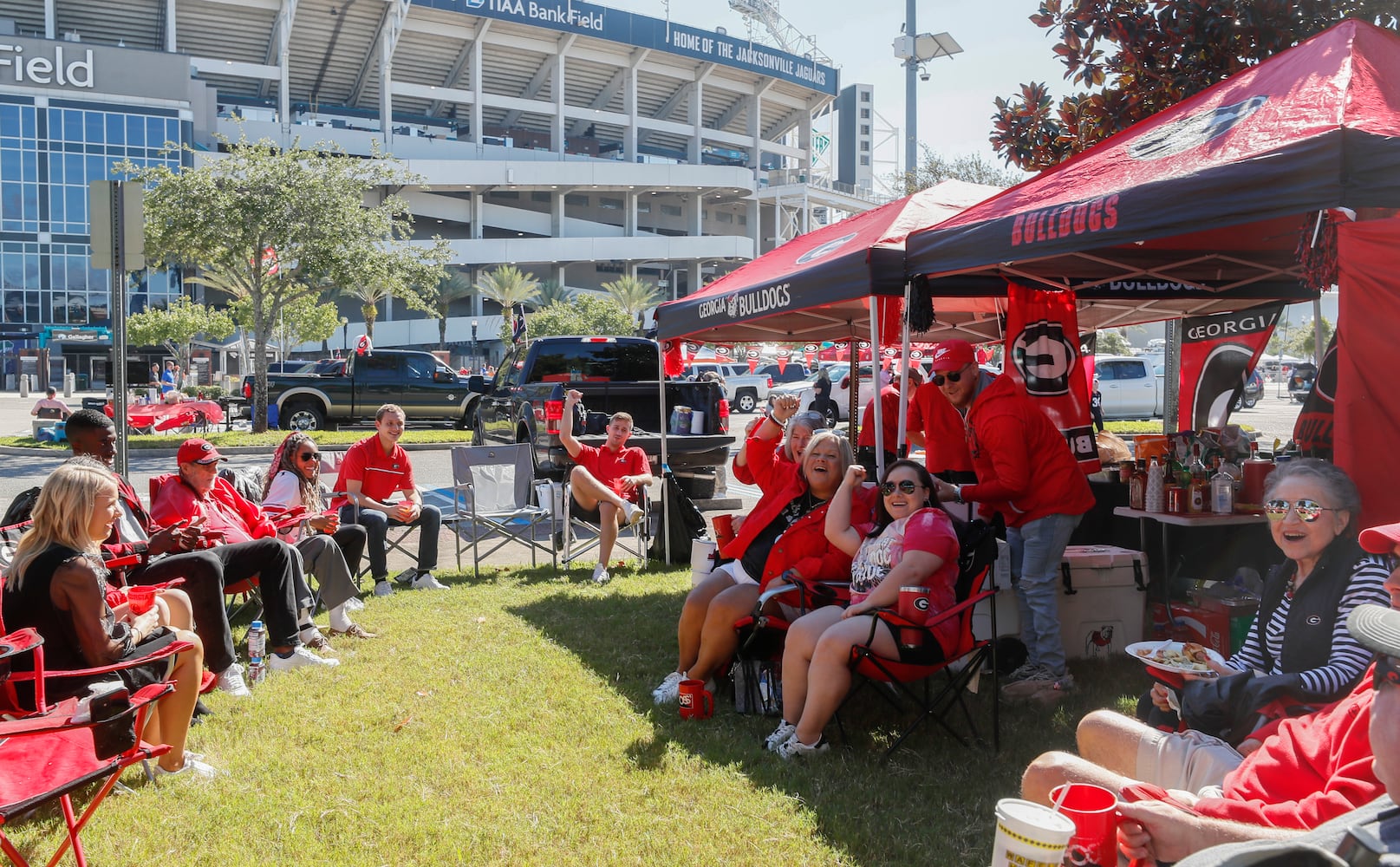 10/30/21 - Jacksonville - A multi-famly tailgate from Athens is set up outside the stadium at the annual NCCA  Georgia vs Florida game at TIAA Bank Field in Jacksonville.  They have been setting up in the same location for more than 20 years.   Bob Andres / bandres@ajc.com