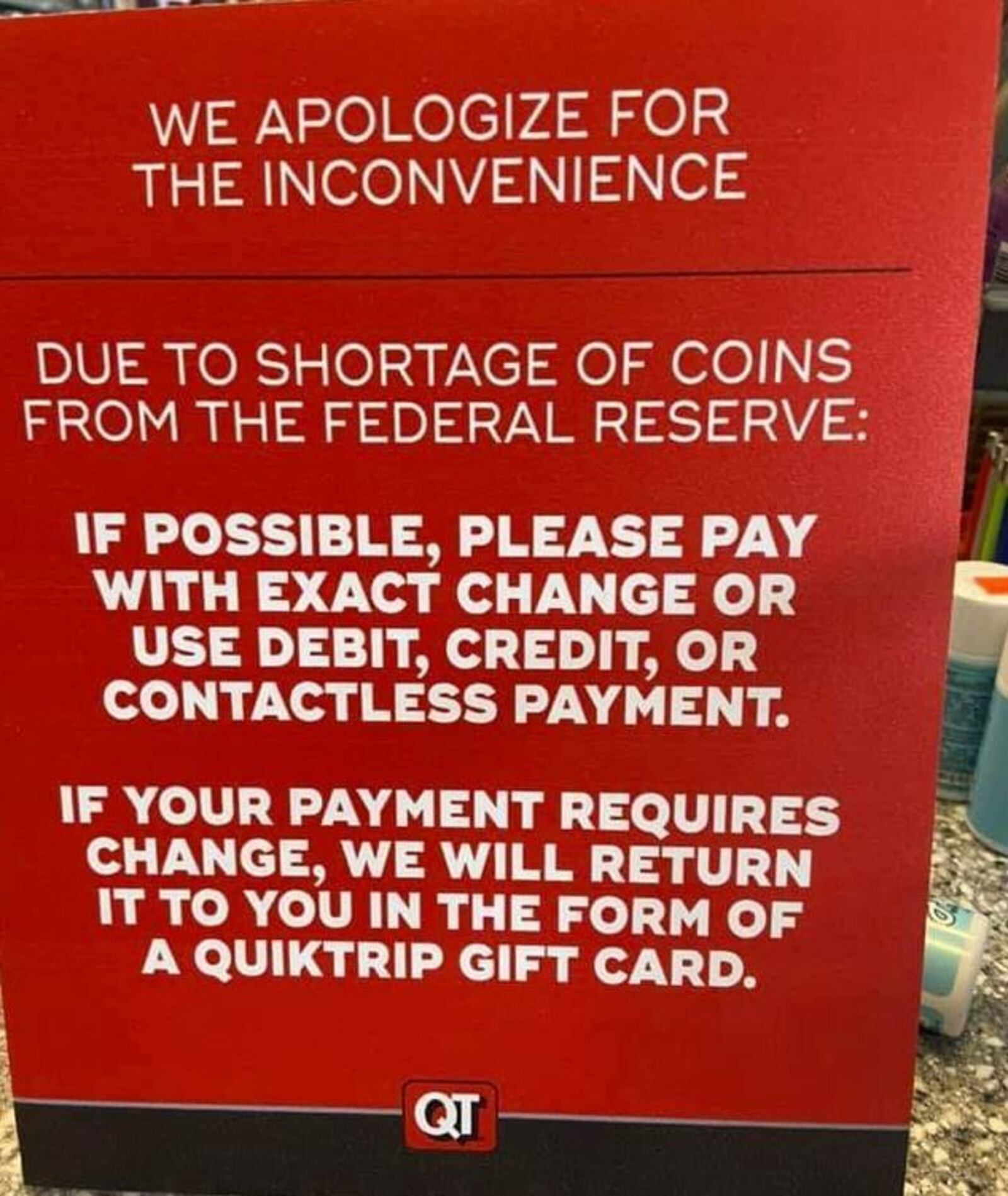 On Monday, a QuikTrip convenience store in Suwanee had a sign posted outside the establishment apologizing to customers and asking them to pay with exact change or by debit or credit “due to shortage of coins from the Federal Reserve.”