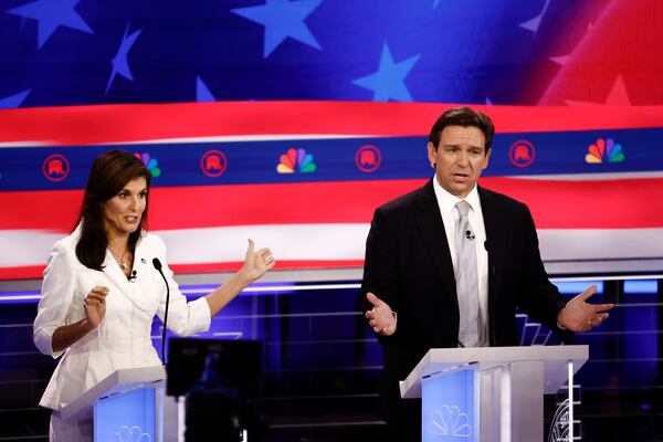 
                        FILE -- Nikki Haley and Florida Gov. Ron DeSantis during the third Republican presidential primary debate in Miami, Nov. 8, 2023. Gov. Gavin Newsom of California will debate DeSantis for 90-minutes on Thursday, Nov. 30, 2023, in Alpharetta, Ga. (Scott McIntyre/The New York Times)
                      