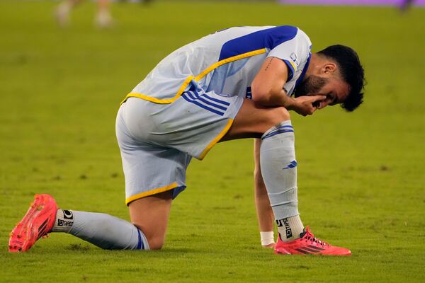 Atlanta United defender Pedro Amador reacts after being eliminated by Orlando City in an MLS Semifinal Conference playoff soccer match, Sunday, Nov. 24, 2024, in Orlando, Fla. (AP Photo/John Raoux)