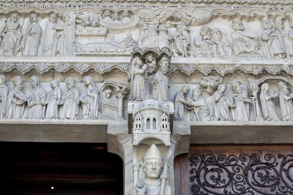 A view of part of a bas-relief outside Notre-Dame de Paris cathedral, Friday, Nov. 29, 2024 in Paris. (Stephane de Sakutin/Pool via AP)