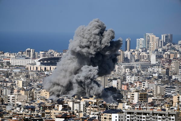 Smoke rises after an Israeli airstrike on Dahiyeh, in the southern suburb of Beirut, Lebanon, Tuesday, Nov. 12, 2024. (AP Photo/Bilal Hussein)