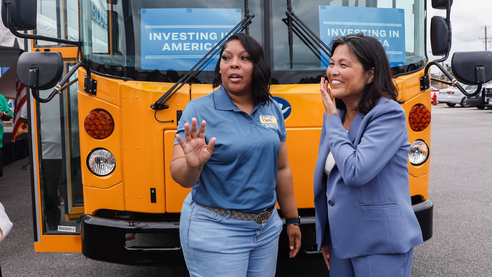 Bluebird employee Delushundra Thomas (left) and acting Secretary of Labor Julie Su chat following an event at the Blue Bird bus plant in Ft. Valley on Friday, July 19, 2024. The Biden-Harris administration plans to expand jobs with a grant of $80 million to Blue Bird to build a new factory that will produce electric buses. (Natrice Miller/AJC)
 