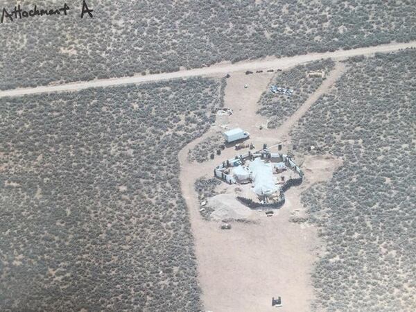 An aerial view of the compound in Amalia, New Mexico, where authorities arrested two metro Atlanta men on Friday in a child abduction case. One of the men, Siraj Wahhaj, is accused of abducting his 3-year-old son from Clayton County in December. His son, Abdul-Ghani Wahhaj, was not found at the compound Friday, but investigators believe he had been there in the past few weeks.