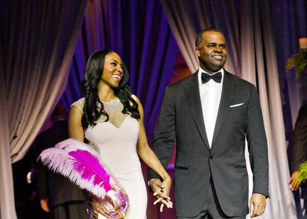 Atlanta Mayor Kasin Reed and his wife Sarah-Elizabeth Langford Reed are introduced during the 2014 United Negro College Fund Mayor’s Masked Ball. Langford Reed was involved in a 2016 accident while she drove a city vehicle she was not authorized to operate. JONATHAN PHILLIPS / SPECIAL