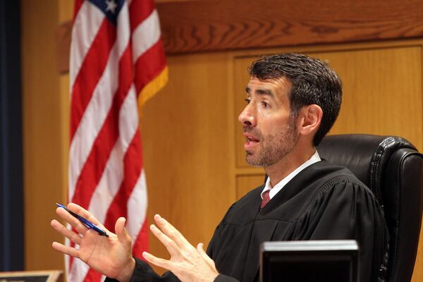 Fulton County Superior Court Judge Robert McBurney presides over a bond revocation hearing in the murder case against Claud “Tex” McIver. (HENRY TAYLOR/ henry.taylor@ajc.com)