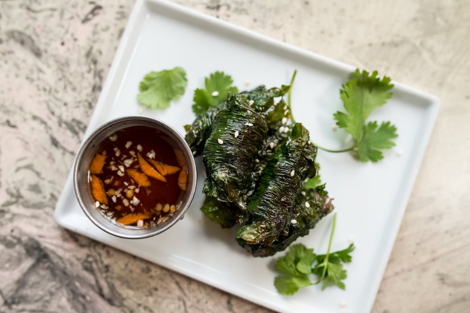  Lo Lat rolls with ground beef, ginger, spices, and betel leaves. Photo credit- Mia Yakel.