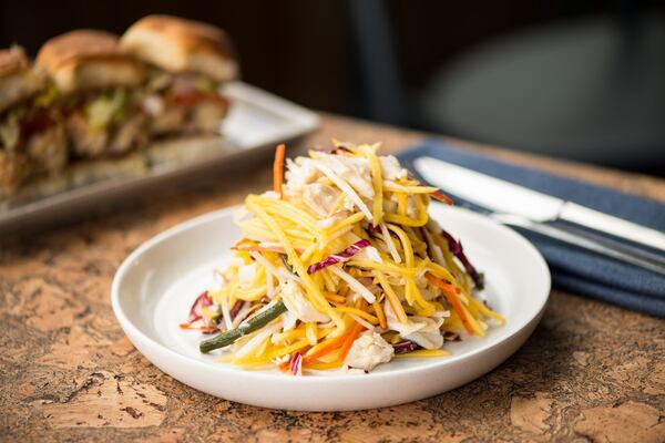 Blue Crab Mango Salad with jicama, green papaya, charred green bean, and jerk vinaigrette. Photo credit- Mia Yakel.