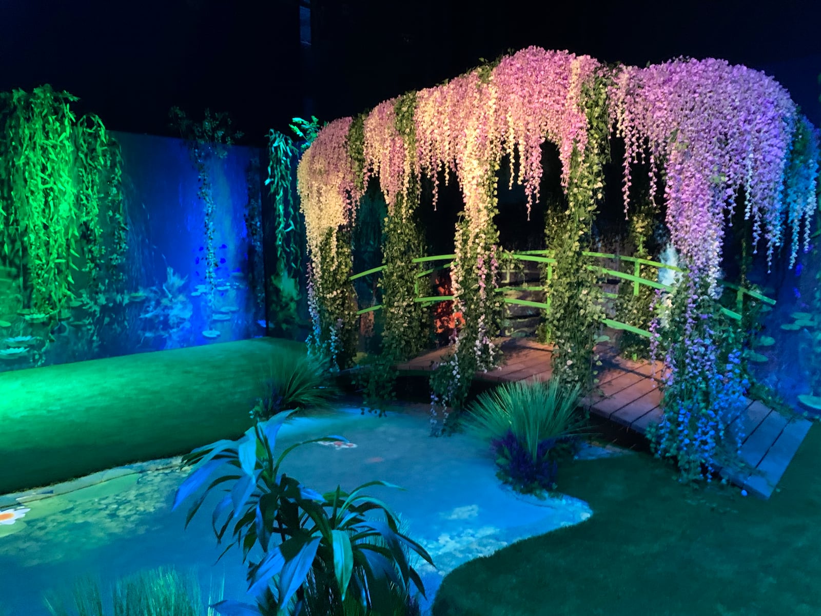 The Monet Experience at Exhibition Hub in Doraville includes a replica of Claude Monet's outdoor garden at Giverny, France. RODNEY HO/rho@ajc.com