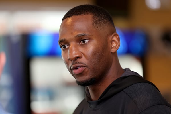 Falcons assistant defensive backs coach Nick Perry was interviewed by members of the media during OTAs on May 26 in Flowery Branch. (Jason Getz / Jason.Getz@ajc.com)