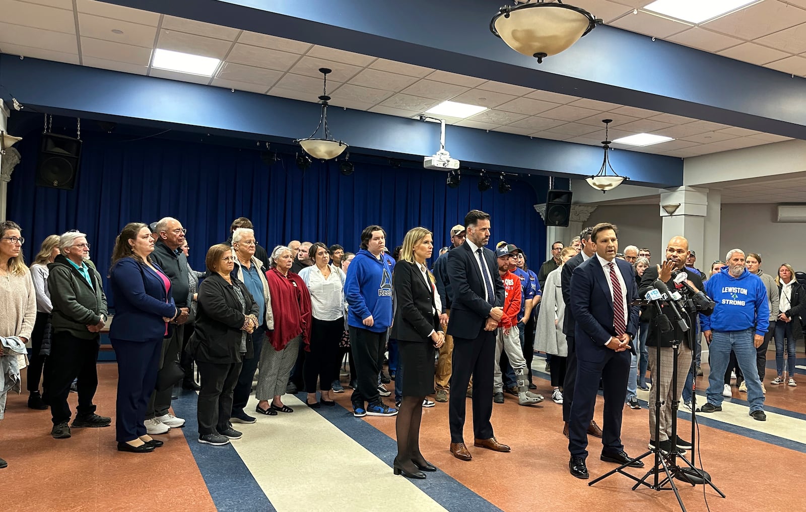 Attorney Ben Gideon speaks at a news conference in Lewiston, Maine, on Tuesday, Oct. 15, 2024, along with victims of the 2023 Lewiston mass shooting. (AP Photo/Patrick Whittle)