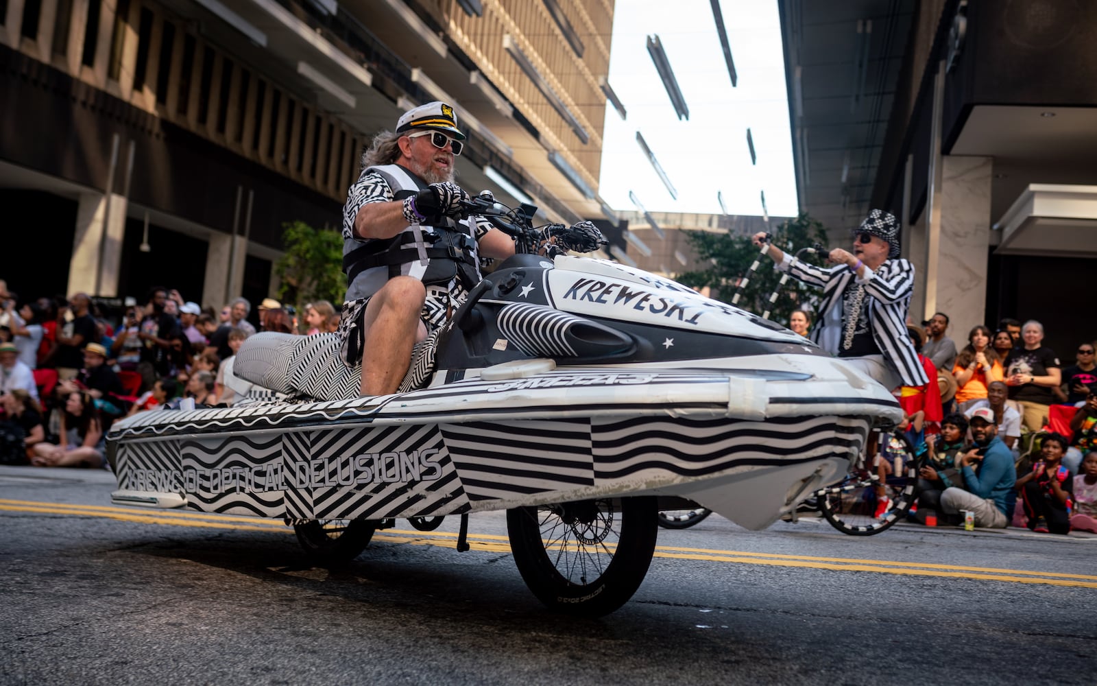 Thousands lined up along Peachtree Street Saturday morning for the annual Dragon Con parade.