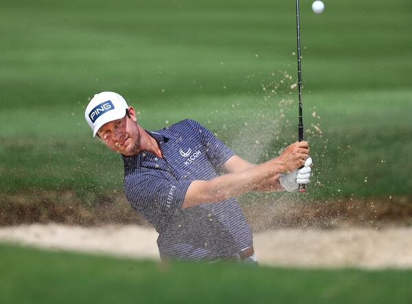 Harris English hits from the bunker to the first green during his practice round for the season-ending Tour Championship at East Lake Golf Club on Wednesday, Sept. 2, 2020 in Atlanta.  Curtis Compton / Curtis.Compton@ajc.com”