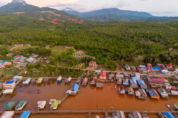 Murky brown water is visible near nickel mining activities that surround Baliara village on Kabaena Island, Southeast Sulawesi, Friday, Nov. 15, 2024. (AP Photo/Yusuf Wahid)