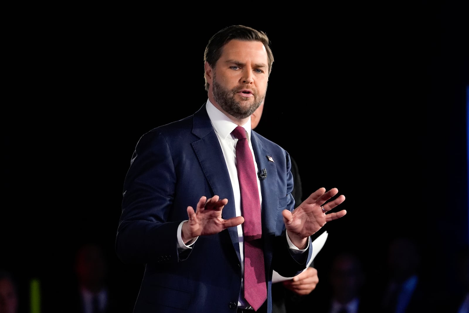 EMBARGOED UNTIL 8PM THURSDAY, OCT 24 Republican vice presidential nominee Sen. JD Vance, R-Ohio speaks during a NewsNation town hall event Thursday, Oct. 24, 2024, in Detroit. (AP Photo/Paul Sancya)