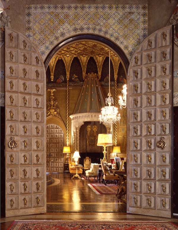 Visitors to Mar-a-Lago, then and now, enter the living room through massive carved doors, seen in this 1993 photograph. Photo / C.J. Walker