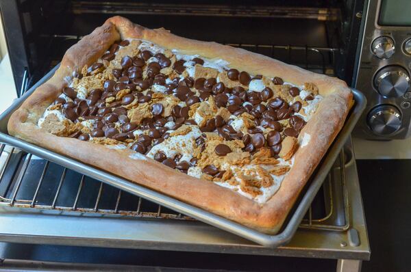 S’mores Pizza made in the toaster oven is a decadent and crowd-friendly dessert. (Virginia Willis for The Atlanta Journal-Constitution)