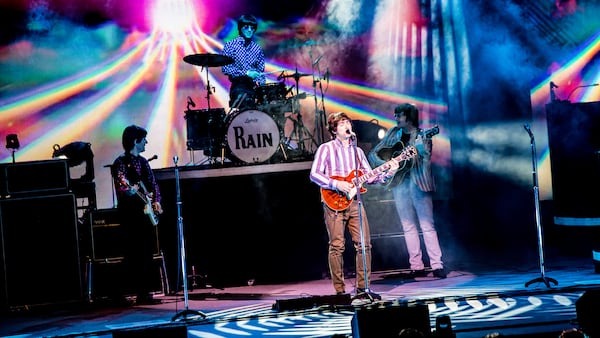  Rain: A Tribute to the Beatles, includes set changes and multimedia elements. Photo: Matt Christine