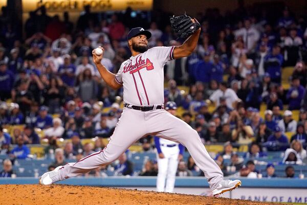 Atlanta Braves relief pitcher Kenley Jansen throws to the plate during the ninth inning of a baseball game against the Los Angeles Dodgers Tuesday, April 19, 2022, in Los Angeles. (AP Photo/Mark J. Terrill)