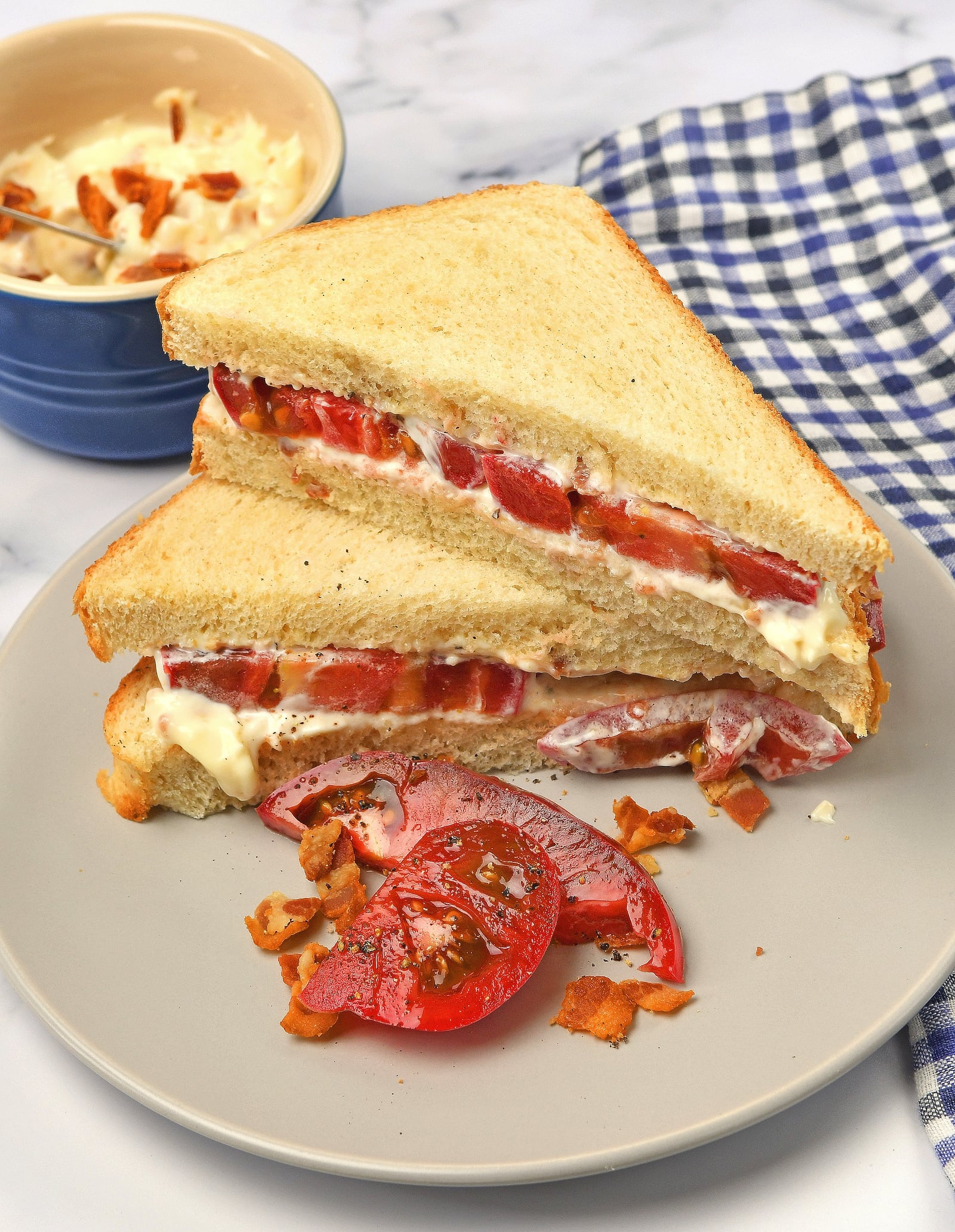 Heirloom Tomato Sandwich with Bacon Mayonnaise. (Styling by Kate Williams / Chris Hunt for the AJC)